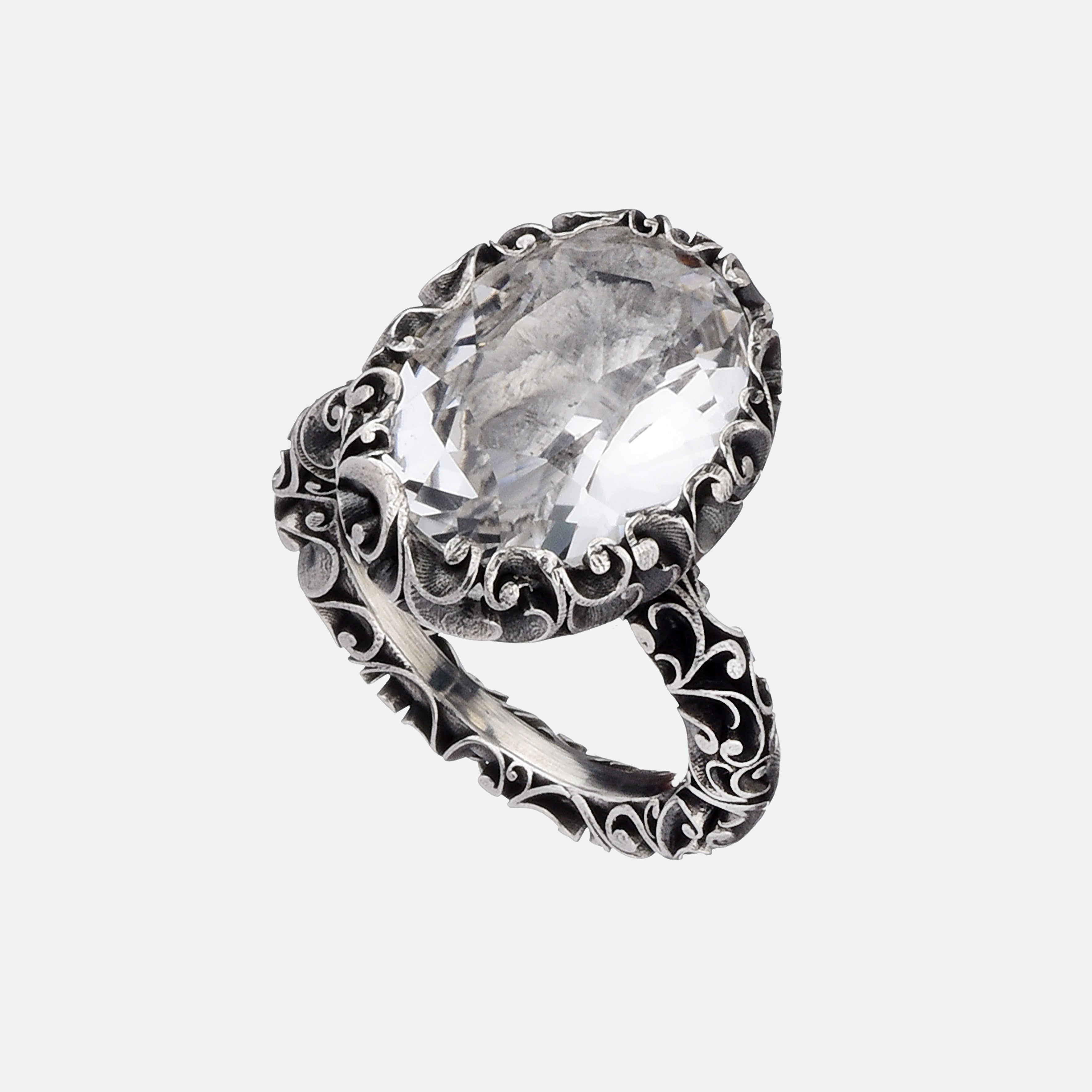 ANELLO IN ARGENTO INTAGLIATO CON PIETRA OVALE  SFACCETTATO PRASIOLITE