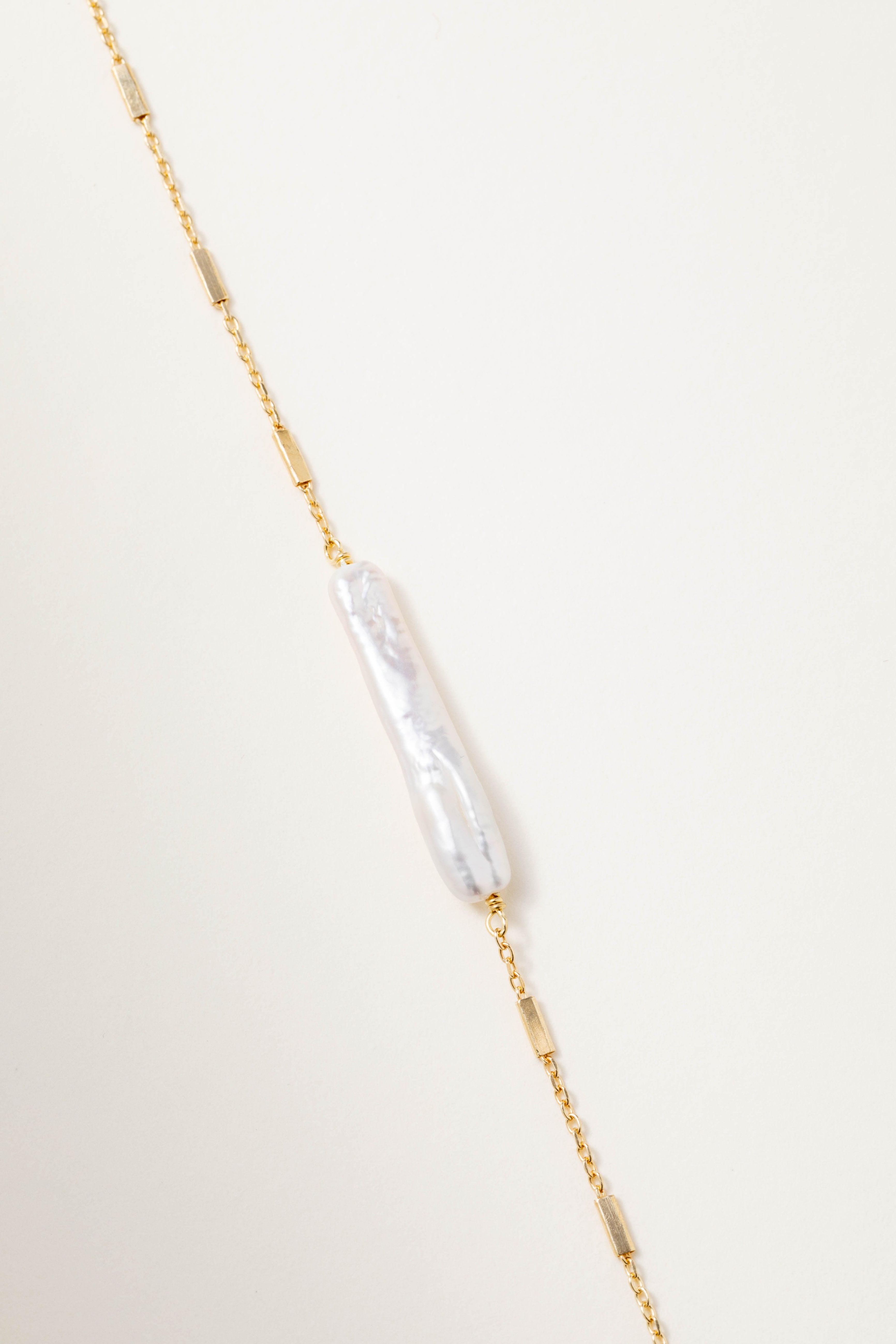 Bracciale catena e perle allungate