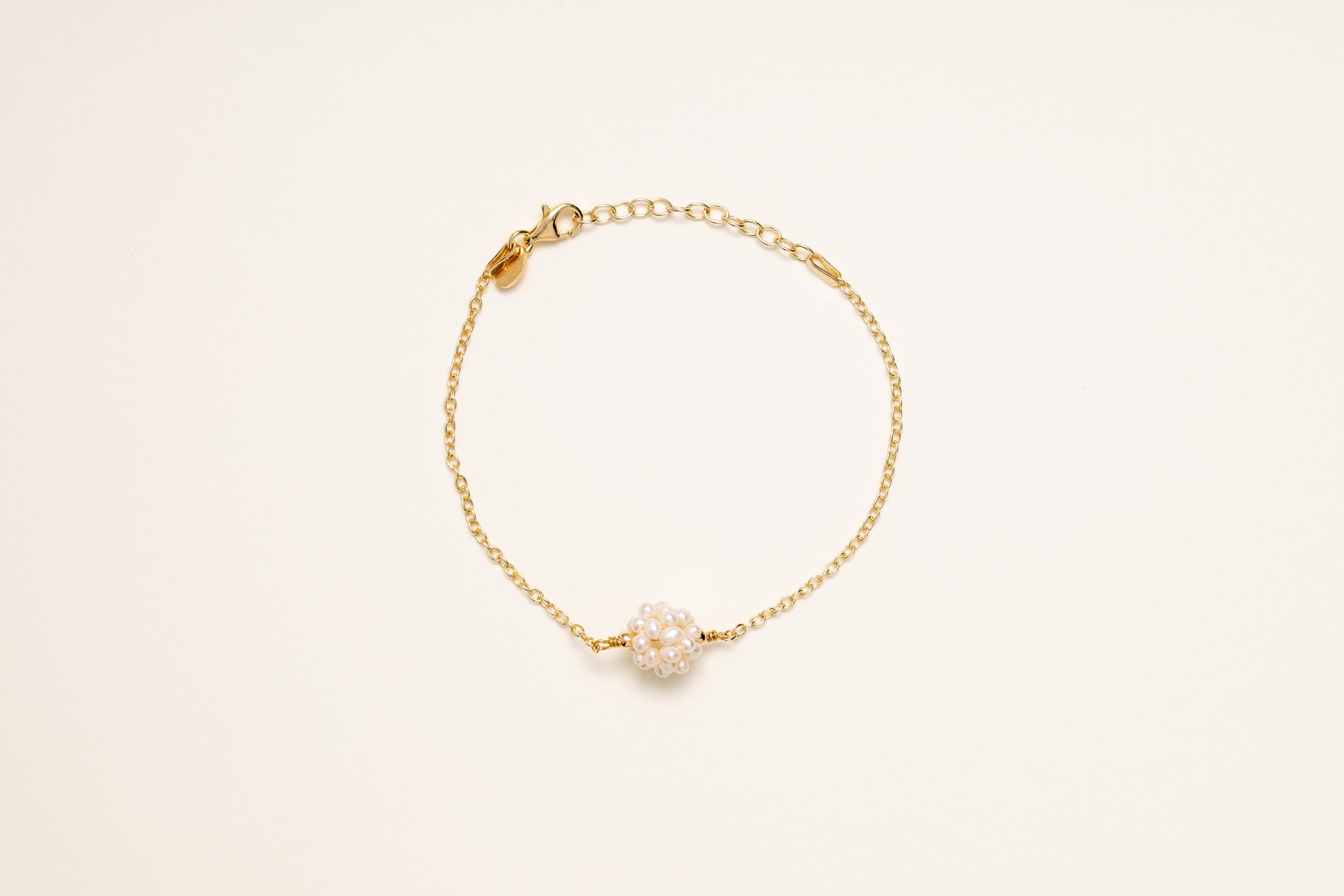 Bracciale con sfera di perle