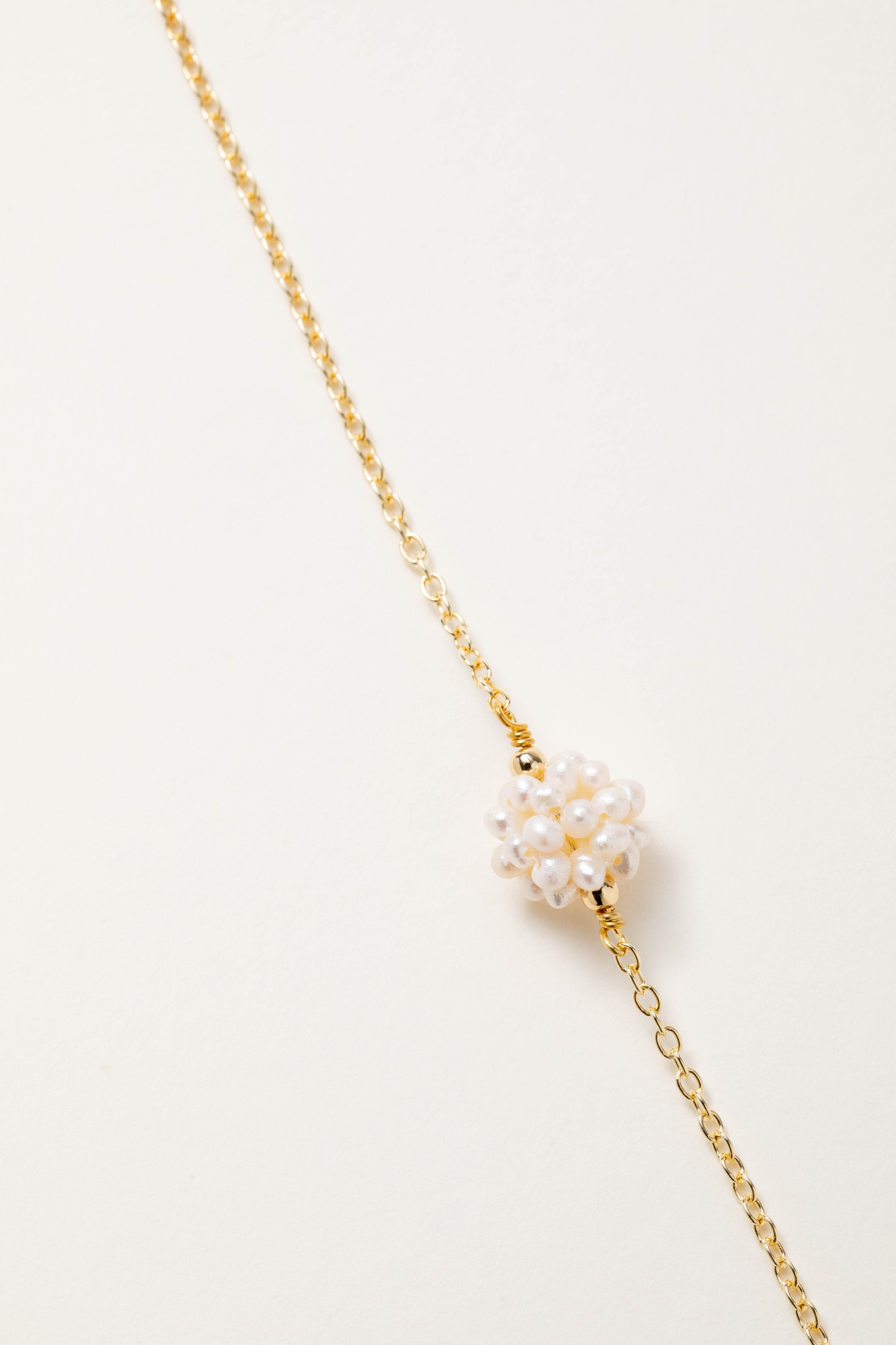 Bracciale con sfera di perle