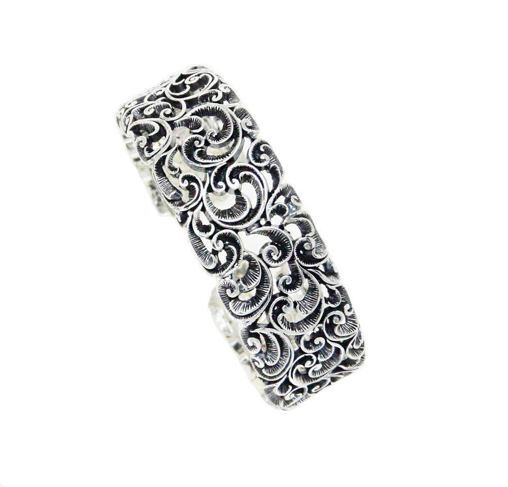 BRACCIALE A MANETTA IN ARGENTO MEDIA INTAGLIATA CON APERTURA LATERALE