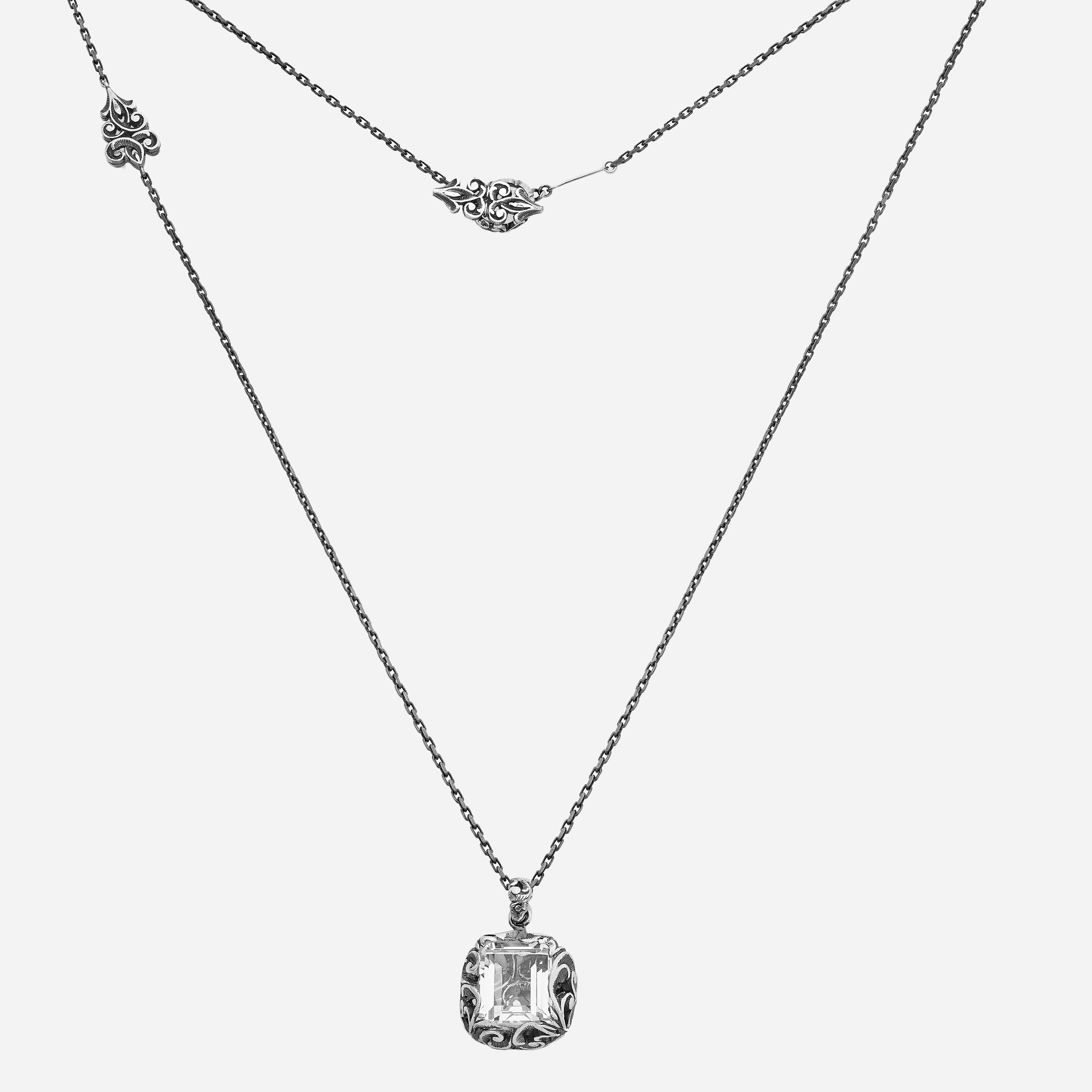 COLLANA IN ARGENTO  CON PIASTRA INTAGLIATA, PIETRA TAGLIO RETTANGOLO SFACCETTATO CRISTALLO DI ROCCA